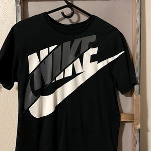 Nike’s “The Nike Tee” athletic cut. Hardly ever worn